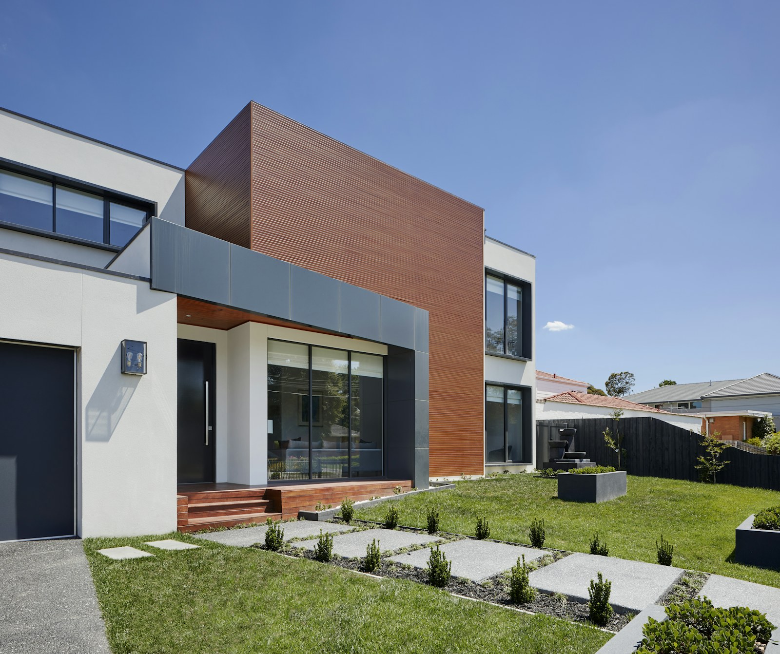 A welcoming, light-filled home exterior